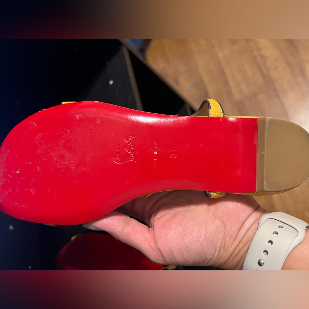 A pair of yellow/gold Christian Louboutin open-toe sandals, size 37.